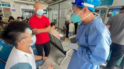 高考花絮丨考生發(fā)高燒 核酸檢測高效接力